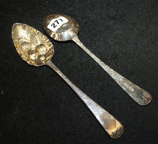 A pair of silver berry spoons